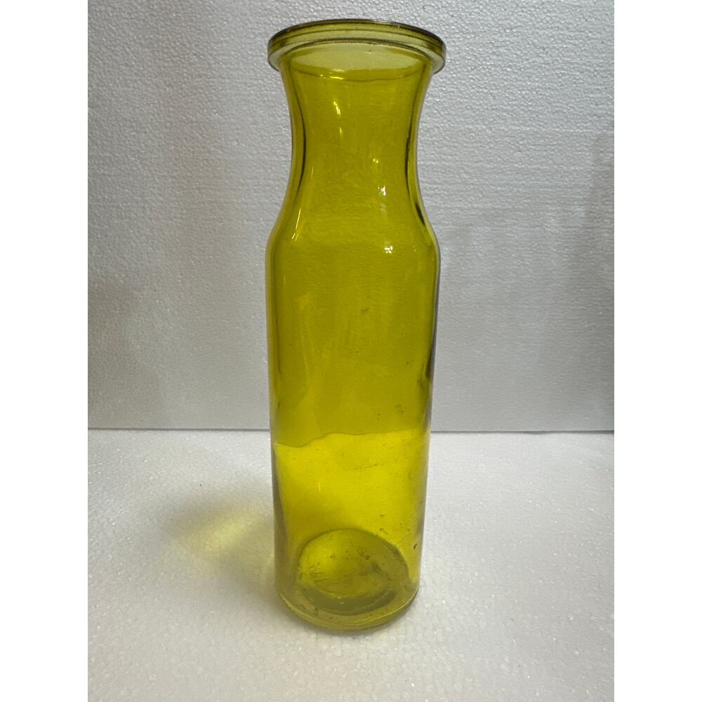 Yellow glass milk bottle 7.75 tall bud vase farm house decoration.